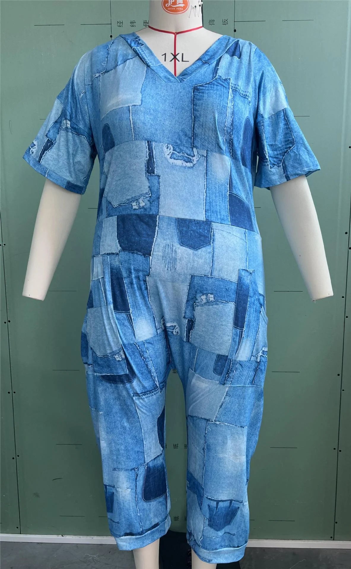 2025 Europe and America Plus Size Summer Loose V-Neck Stitched Patch Pocket Printed Jumpsuit