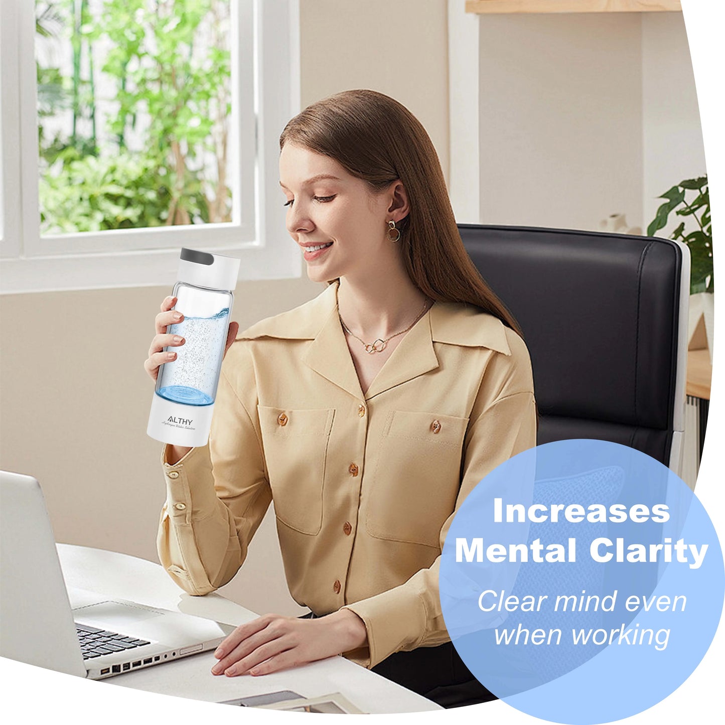 Person working at desk with ALTHY hydrogen water bottle – boosts mental clarity