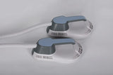 Closeup angled view of the EMS muscle stimulator showing control panel and double applicator pads.