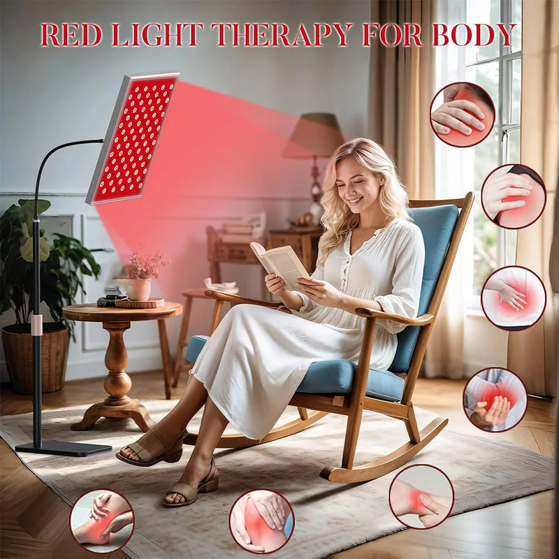  Woman sitting with red light therapy panel for full-body pain relief and recovery

