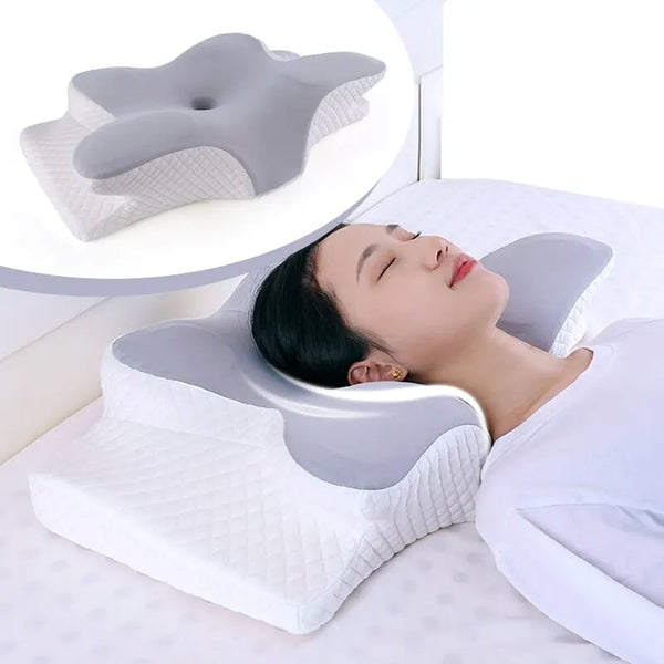 Woman sleeping on orthopedic memory foam butterfly pillow for neck and spine alignment
