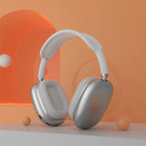 P9 silver Bluetooth headphones on display – side view with control buttons and mic