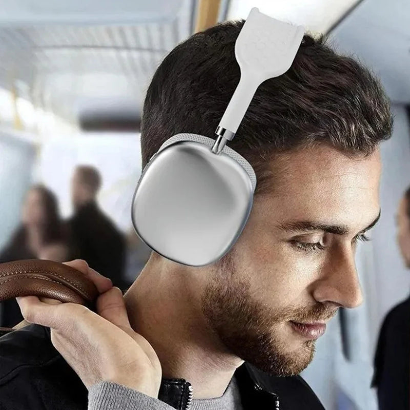 P9 Wireless Bluetooth Headphones worn by man on train – sleek silver over-ear design
