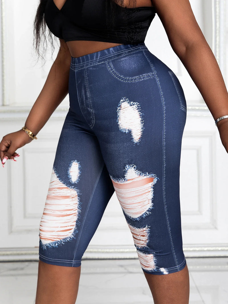 Plus size faux denim capri pants with torn print design and mid-calf cut – high-waist knit leggings look